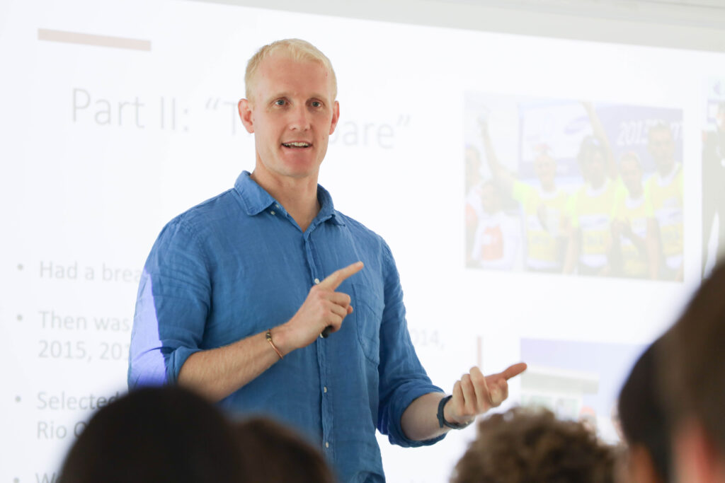 Oxford Scholars in a leadership session with an Olympian